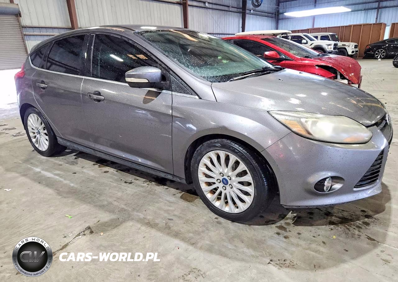 2012 Ford Focus Titanium VIN:1FAHP3N27CL444561 - 4