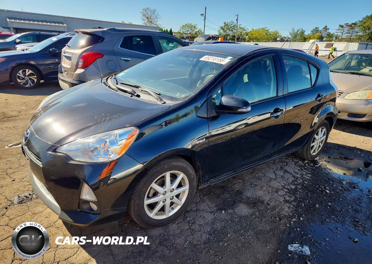 2014 Toyota Prius C Four VIN:JTDKDTB3XE1080155 - 1