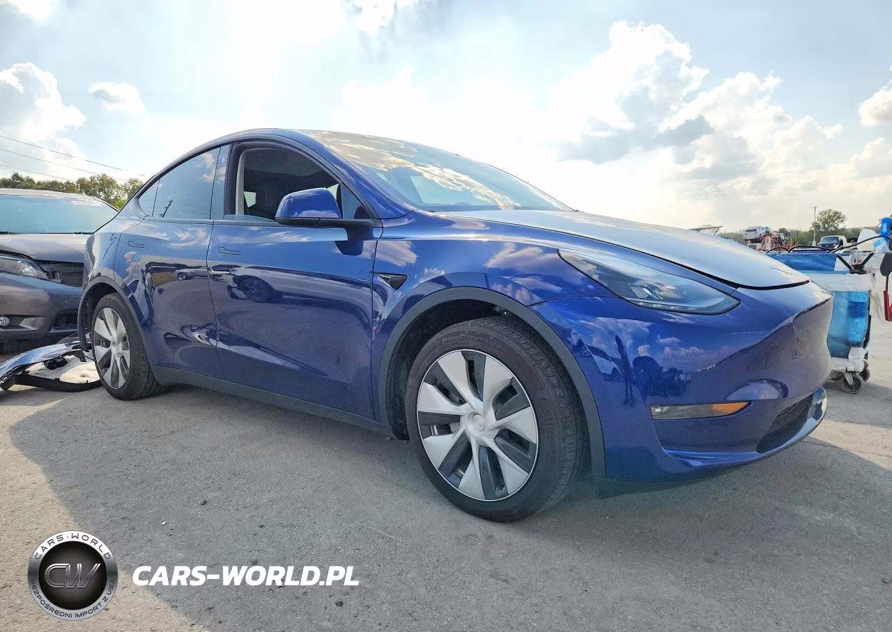 2023 Tesla Model Y VIN:7SAYGAEEXPF775171 - 4