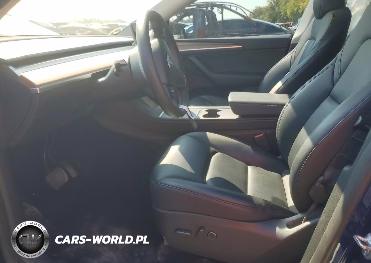 2023 Tesla Model Y VIN:7SAYGAEEXPF775171 - 7