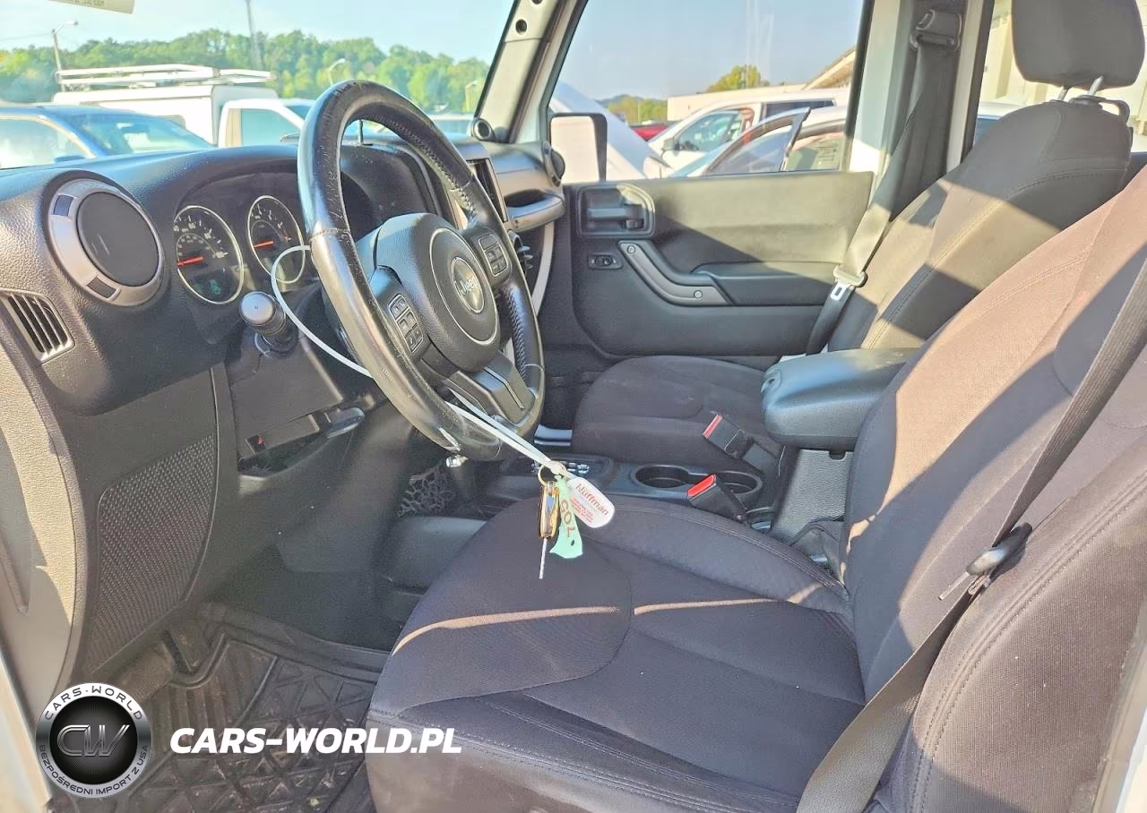 2014 Jeep Wrangler Unlimited Sport VIN:1C4BJWDGXEL116084 - 7
