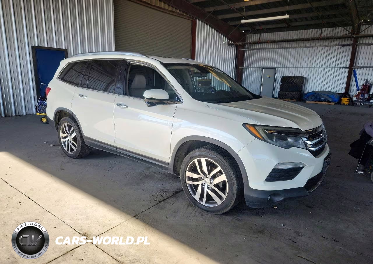 2017 Honda Pilot Touring VIN:5FNYF6H94HB003262 - 4