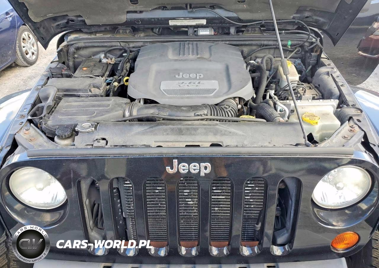 2012 Jeep Wrangler Unlimited Sahara VIN:1C4BJWEG1CL279766 - 12