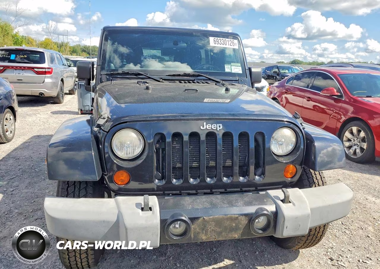 2012 Jeep Wrangler Unlimited Sahara VIN:1C4BJWEG1CL279766 - 5