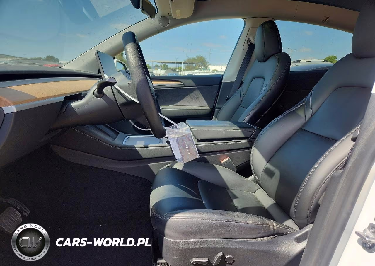 2023 Tesla Model Y VIN:7SAYGDEE3PA188132 - 7