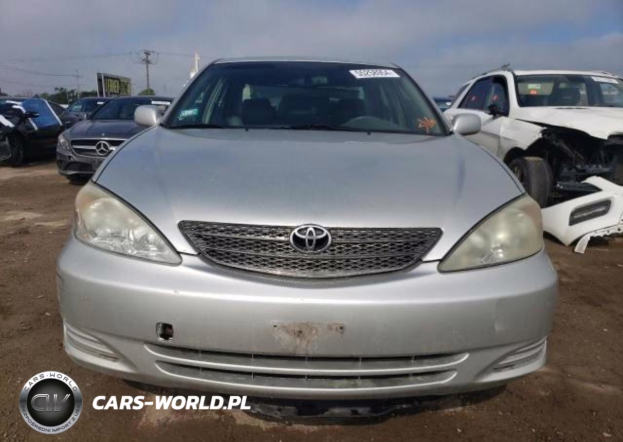 2002 Toyota Camry Le VIN:JTDBF30KX20001377 - 5