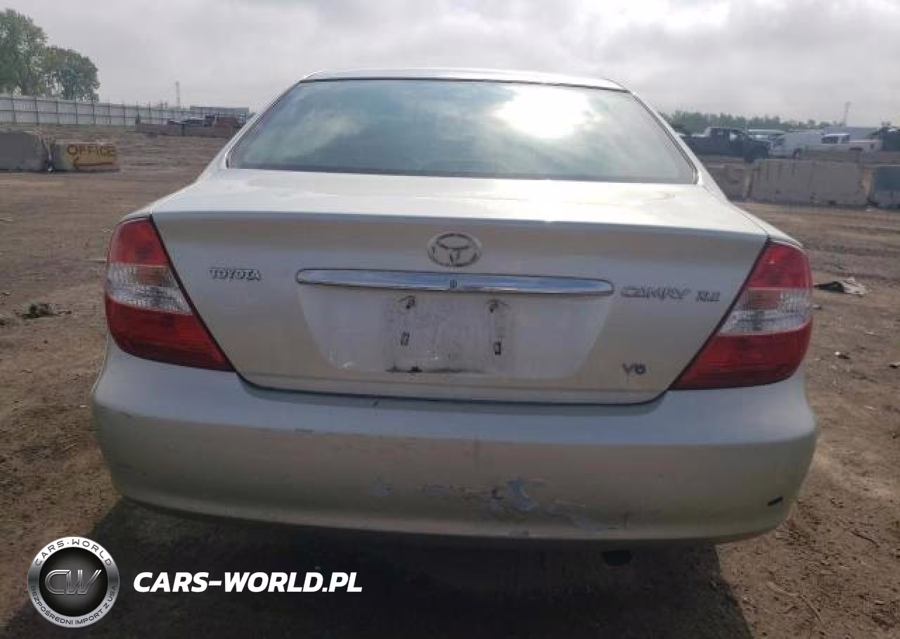 2002 Toyota Camry Le VIN:JTDBF30KX20001377 - 6