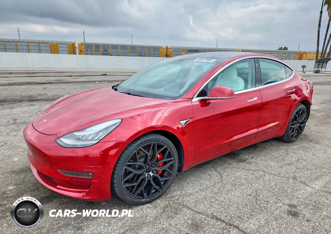 2019 Tesla Model 3 VIN:5YJ3E1EB0KF477594 - 1