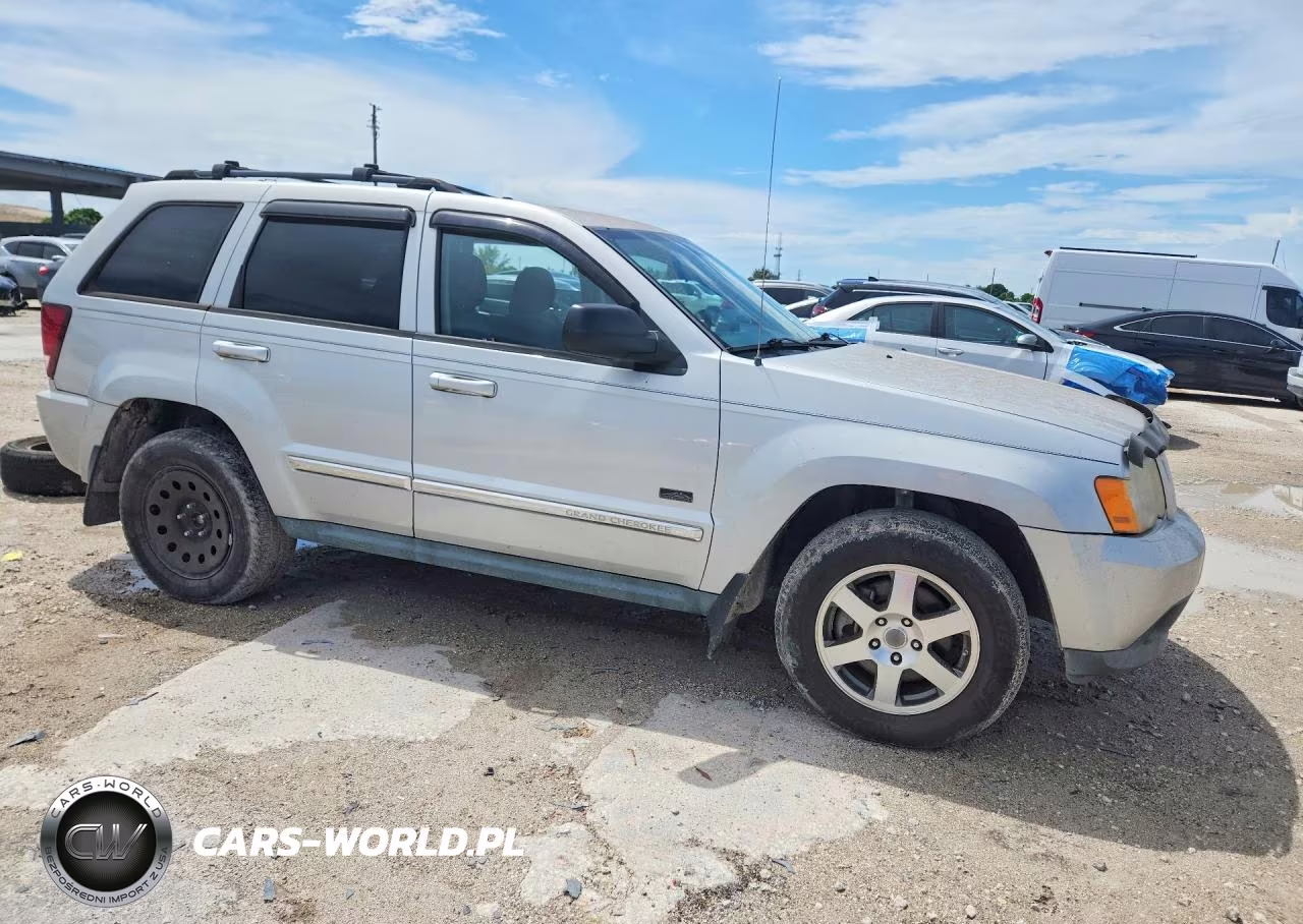 2009 Jeep Grand Cherokee Laredo VIN:1J8GR48K79C547854 - 4