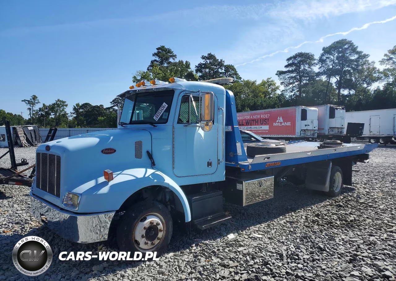 2001 Peterbilt 330 - Flat Bed Truck – zdjęcie 1 z 13