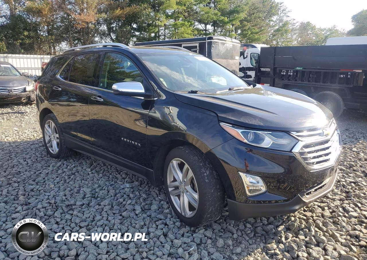 2018 Chevrolet Equinox Premier VIN:2GNAXWEX0J6330391 - 4