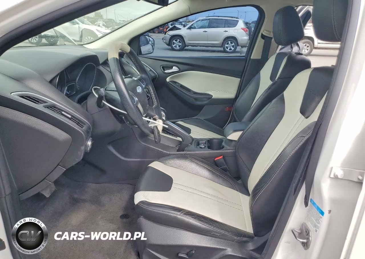 2012 Ford Focus Titanium VIN:1FAHP3N23CL210529 - 7