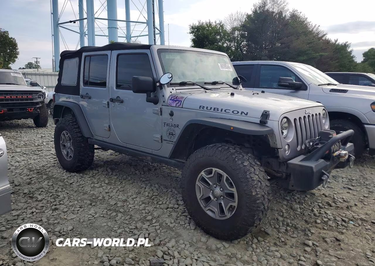 2015 Jeep Wrangler Unlimited Rubicon VIN:1C4BJWFG8FL511220 - 4
