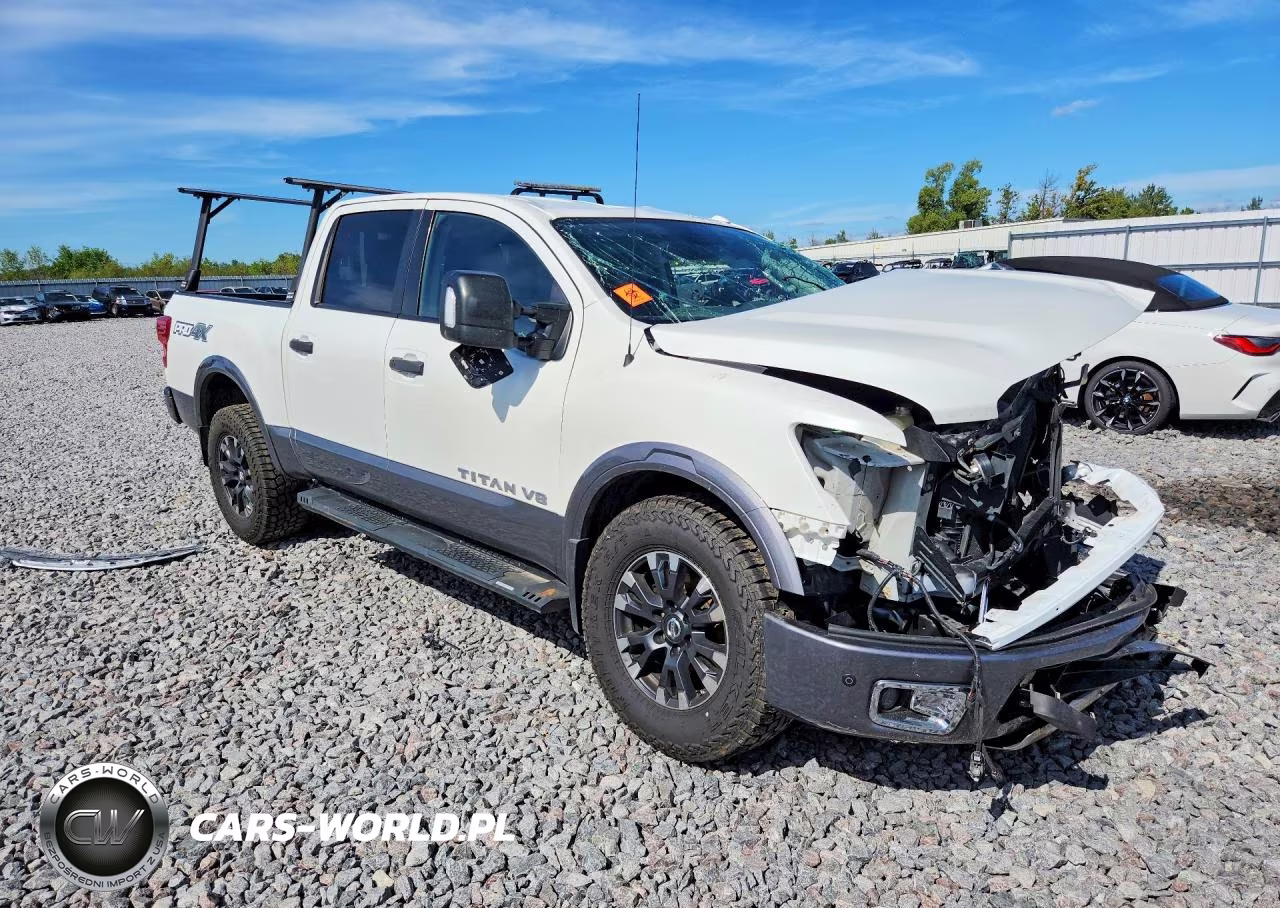 2018 Nissan Titan Pro-4X VIN:1N6AA1E5XJN551761 - 4