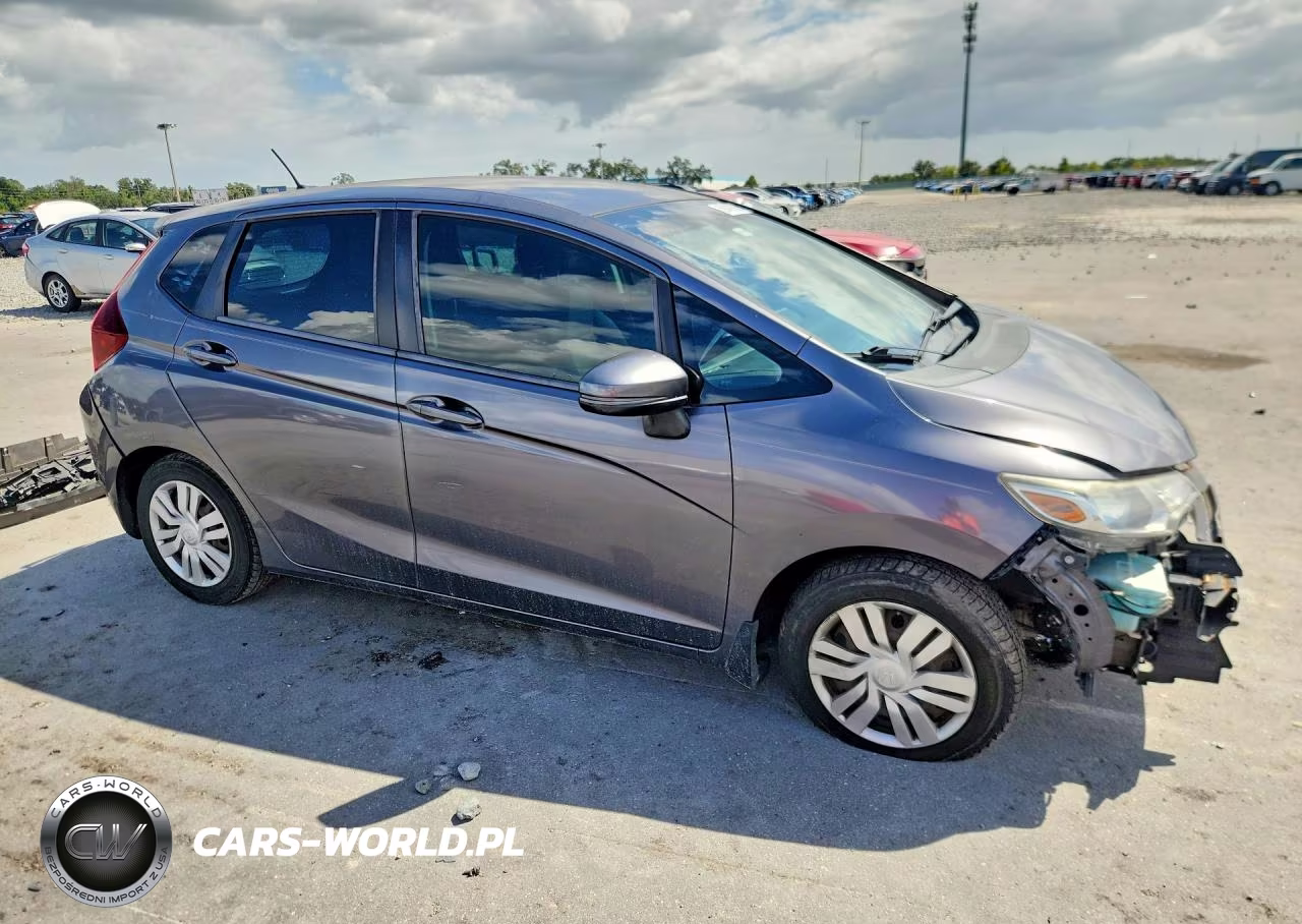 2015 Honda Fit Lx VIN:3HGGK5H57FM708534 - 4