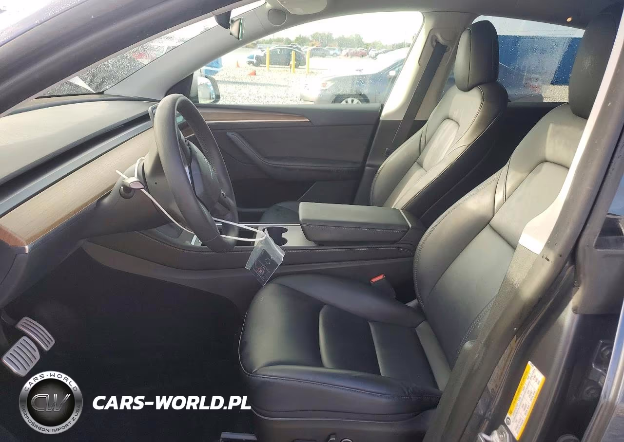 2023 Tesla Model Y VIN:7SAYGDEF6PF582459 - 7