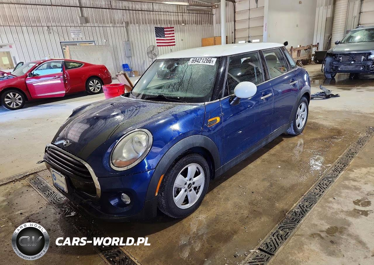 2017 Mini Cooper VIN:WMWXU1C3XH2F78167 - 1