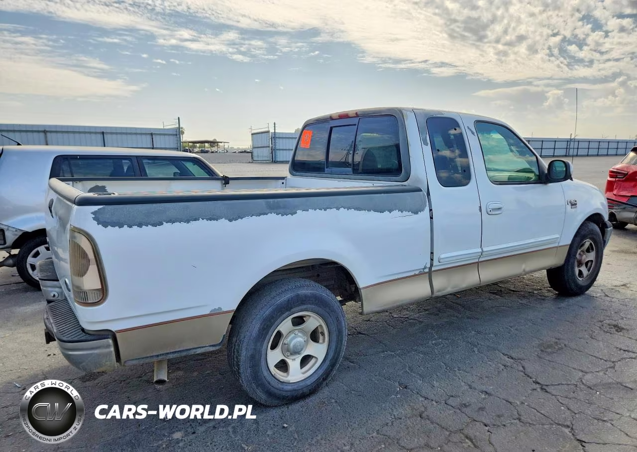 1999 Ford F150 VIN:1FTRX17L2XKA10777 - 3