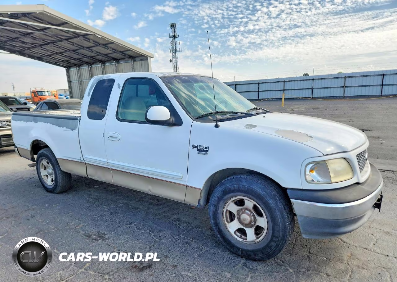 1999 Ford F150 VIN:1FTRX17L2XKA10777 - 4