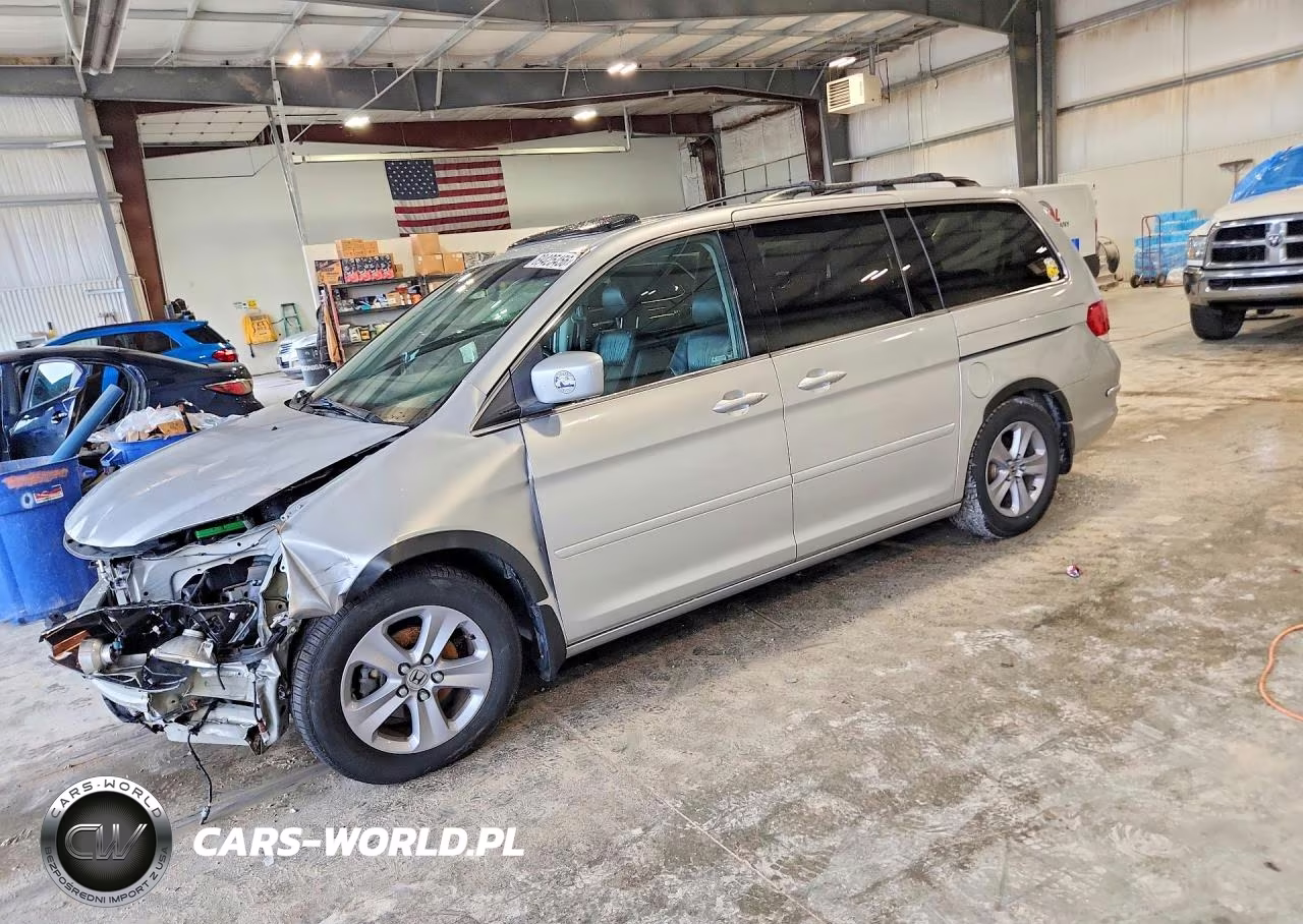 2010 Honda Odyssey Touring VIN:5FNRL3H97AB099485 - 1