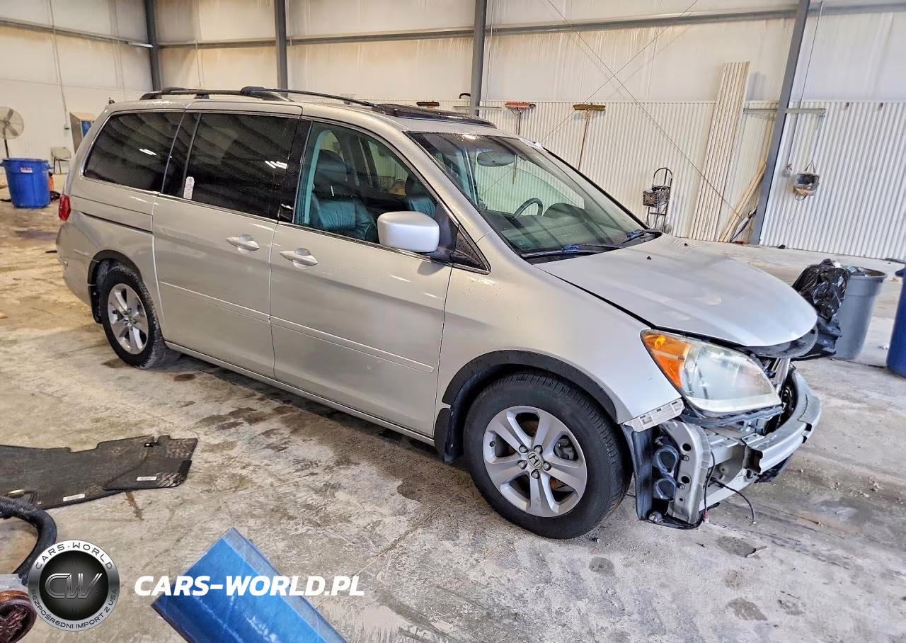 2010 Honda Odyssey Touring VIN:5FNRL3H97AB099485 - 4