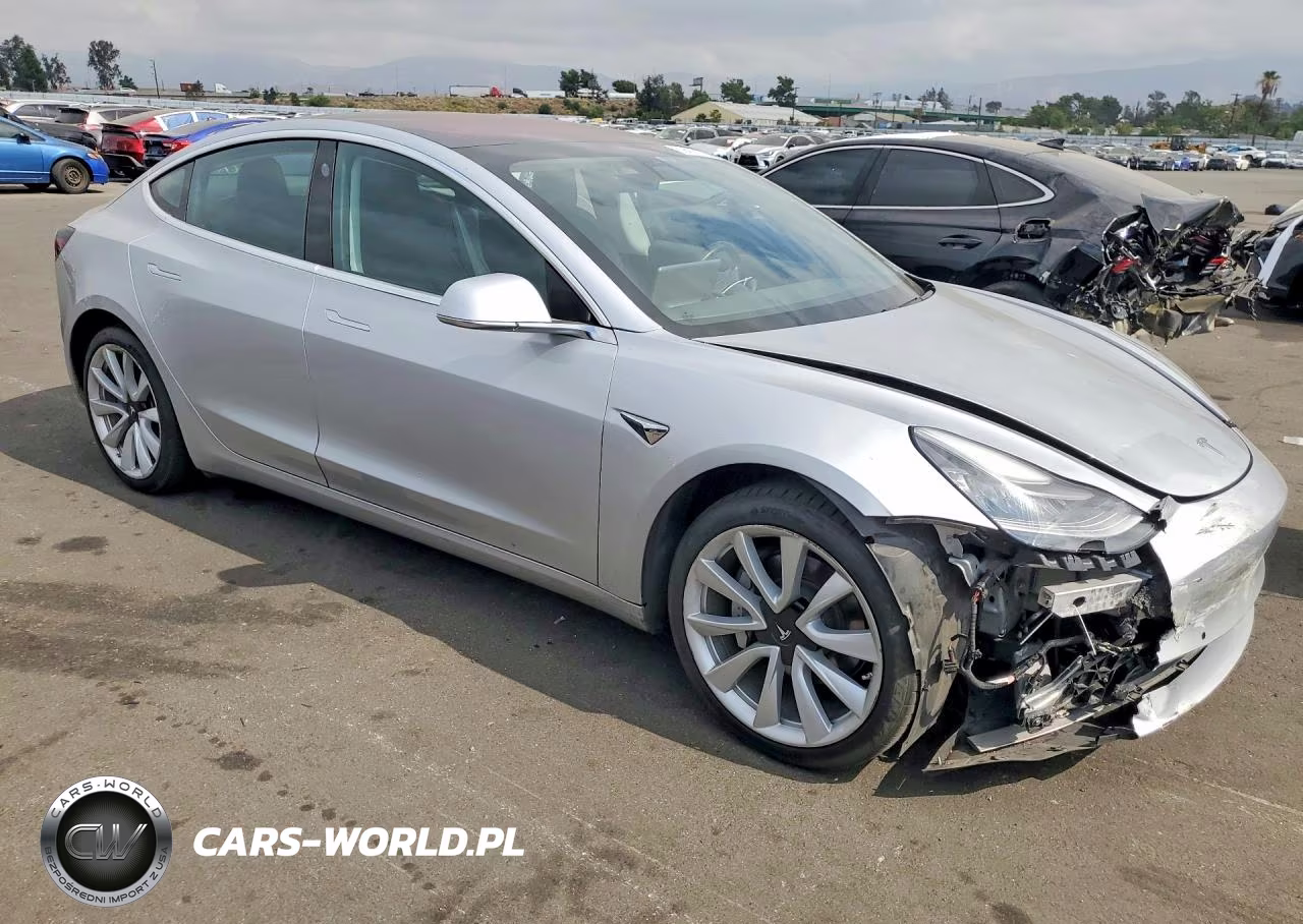 2017 Tesla Model 3 VIN:5YJ3E1EA5HF001874 - 4