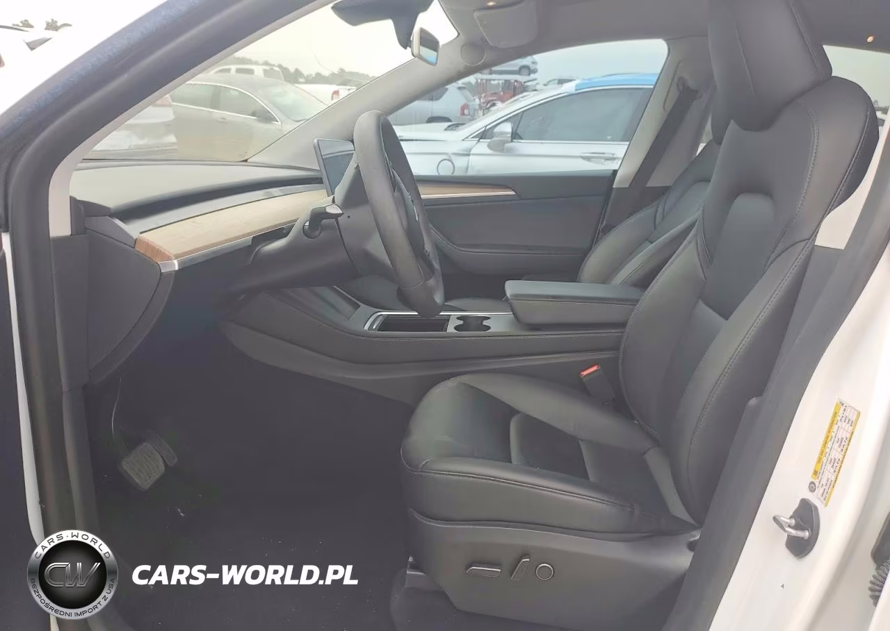 2023 Tesla Model Y VIN:7SAYGDEE4PA117540 - 7