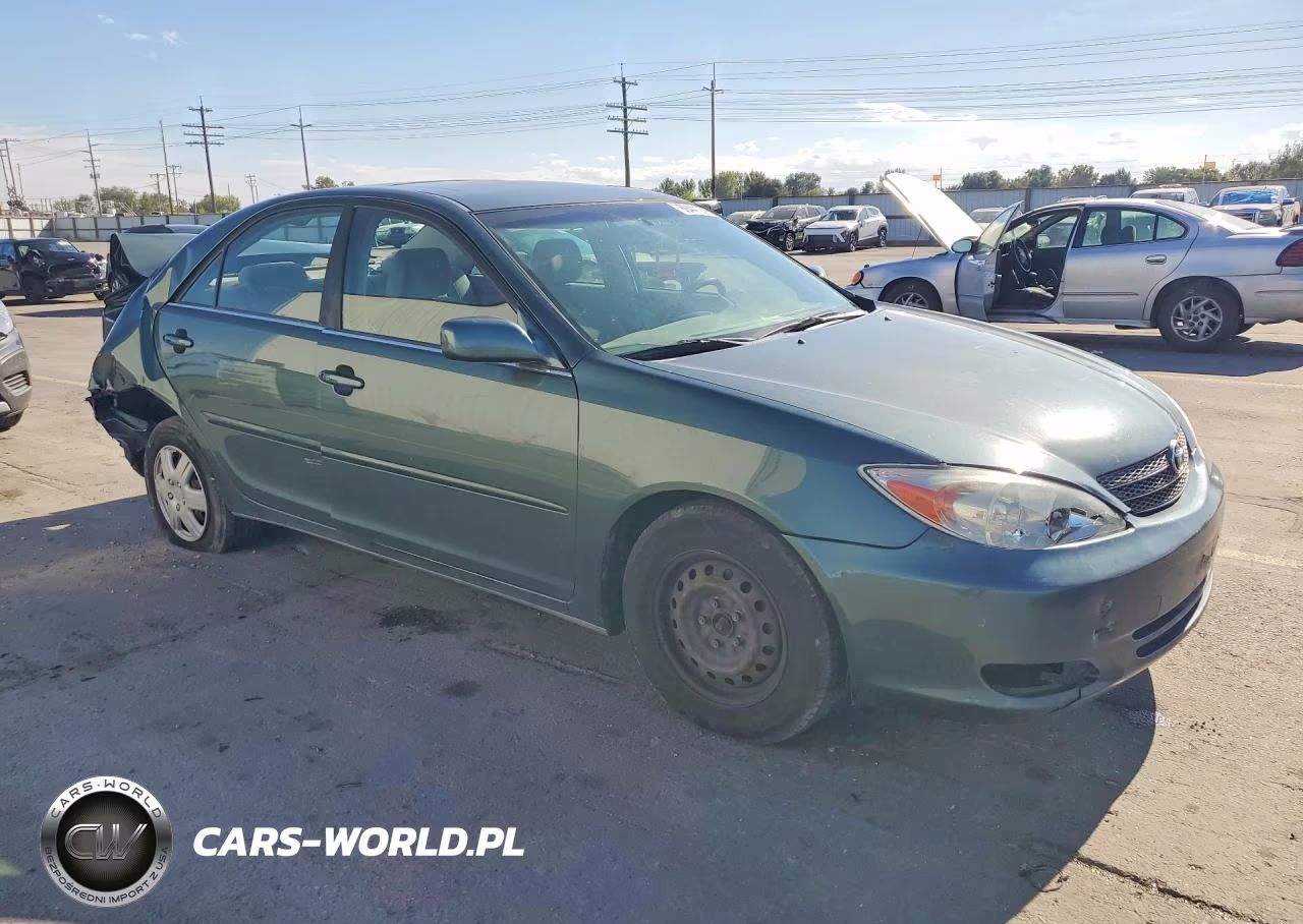 2004 Toyota Camry Le VIN:JTDBE32K940255374 - 4