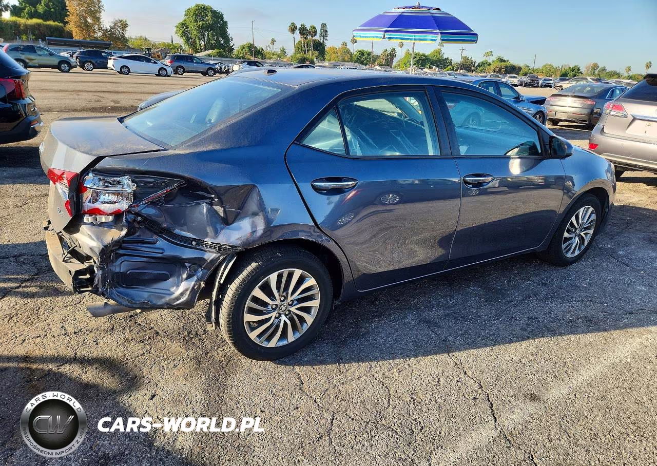 2018 Toyota Corolla Xle VIN:5YFBURHE3JP832070 - 3