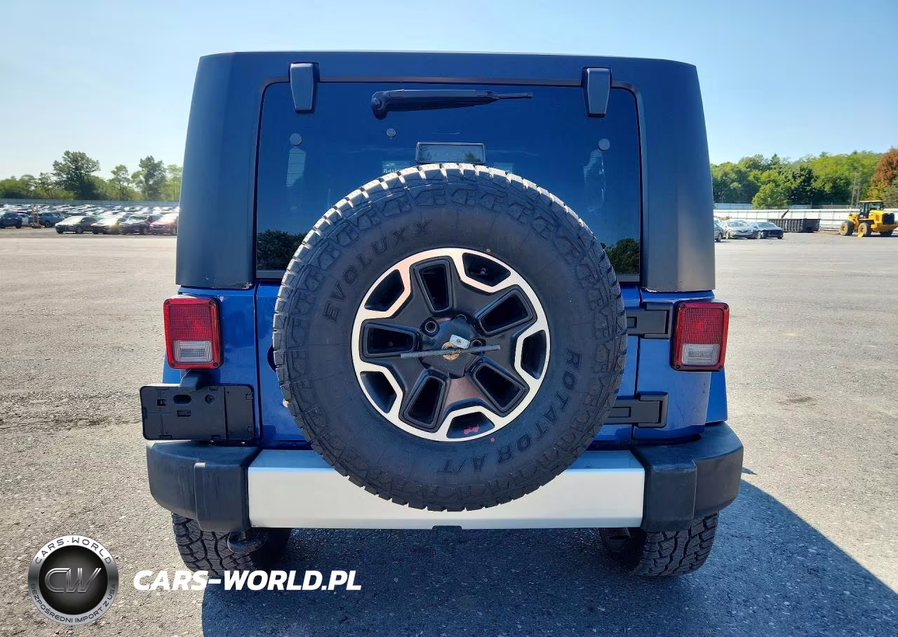 2009 Jeep Wrangler Unlimited Sahara VIN:1J8GA591X9L735979 - 6