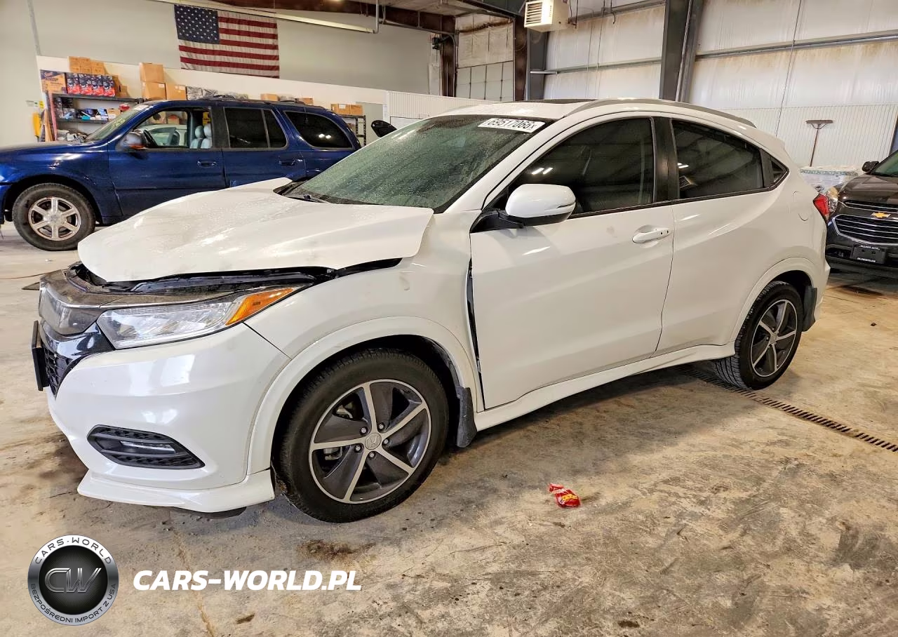 2019 Honda Hr-V Touring VIN:3CZRU6H94KM702219 - 1
