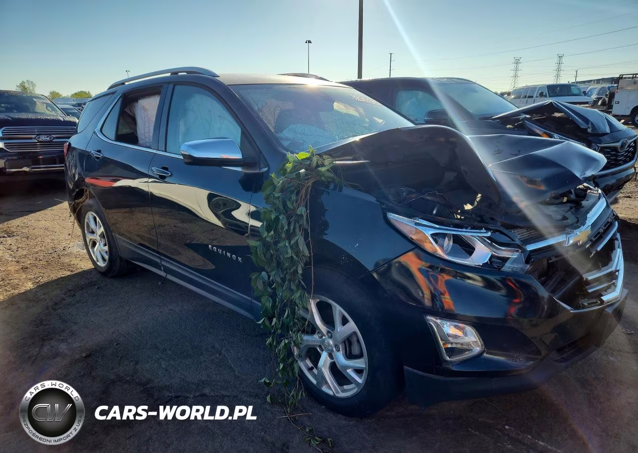 2018 Chevrolet Equinox Premier VIN:2GNAXVEV0J6324082 - 4