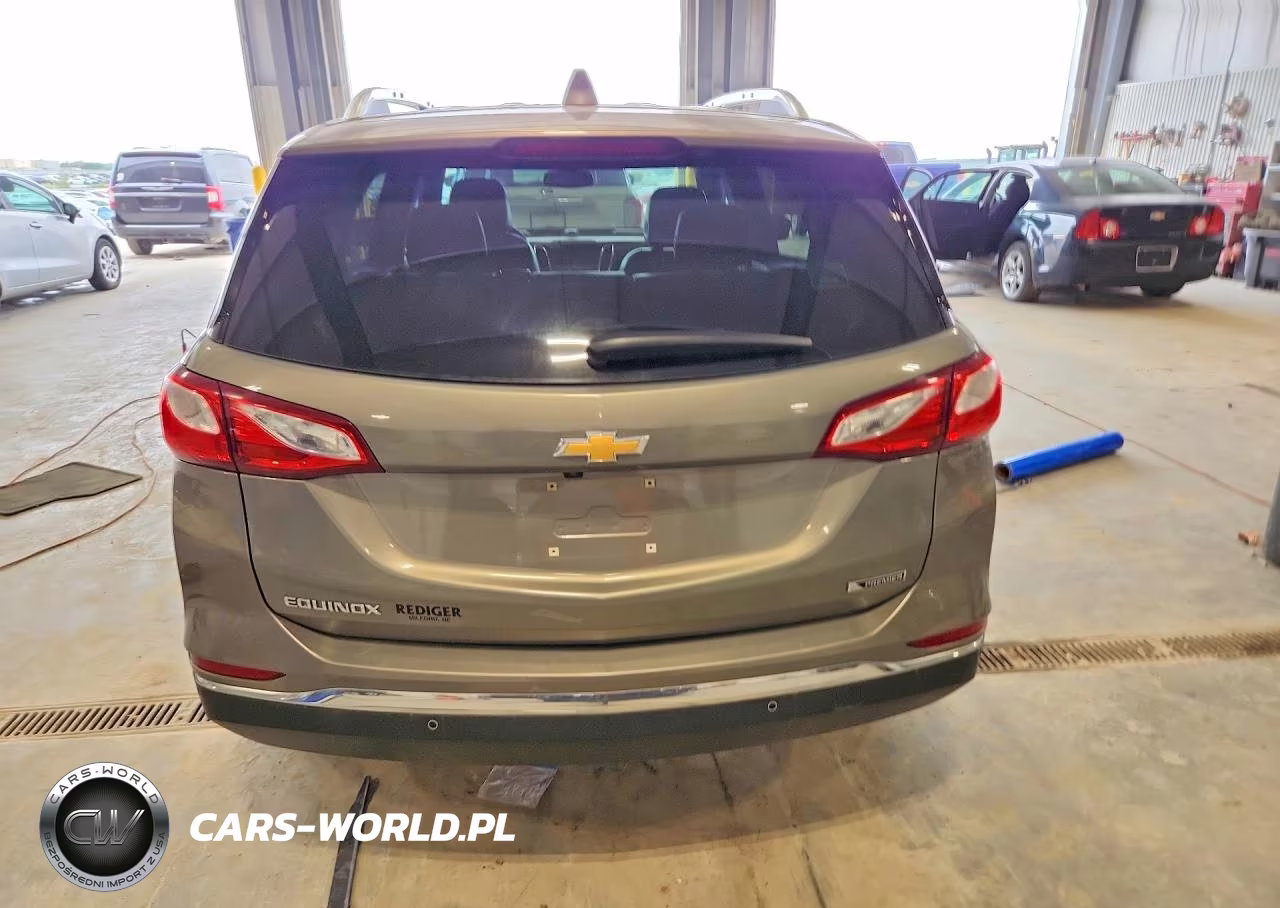 2018 Chevrolet Equinox Premier VIN:3GNAXMEV9JS621458 - 6