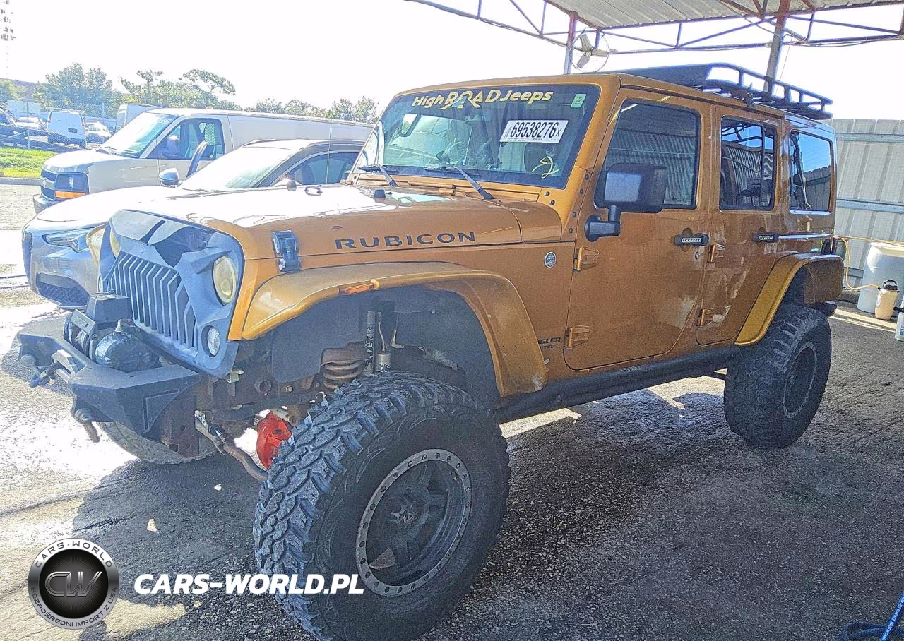 2014 Jeep Wrangler Unlimited Rubicon VIN:1C4BJWFG1EL318504 - 1