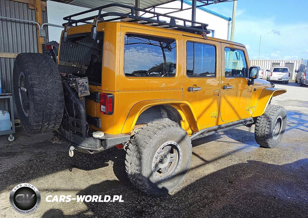 2014 Jeep Wrangler Unlimited Rubicon VIN:1C4BJWFG1EL318504 - 3