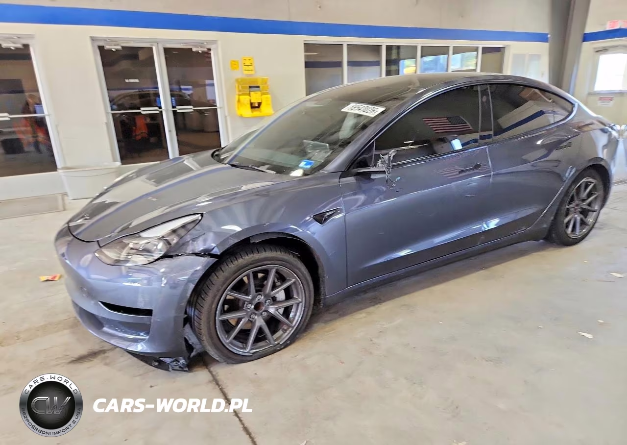 2023 Tesla Model 3 VIN:5YJ3E1EA7PF570496 - 1