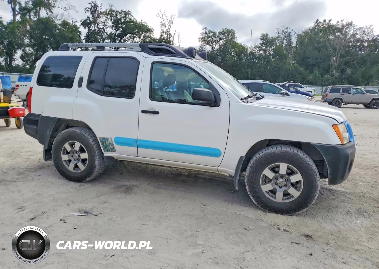 2011 Nissan Xterra X VIN:5N1AN0NW6BC520347 - 4