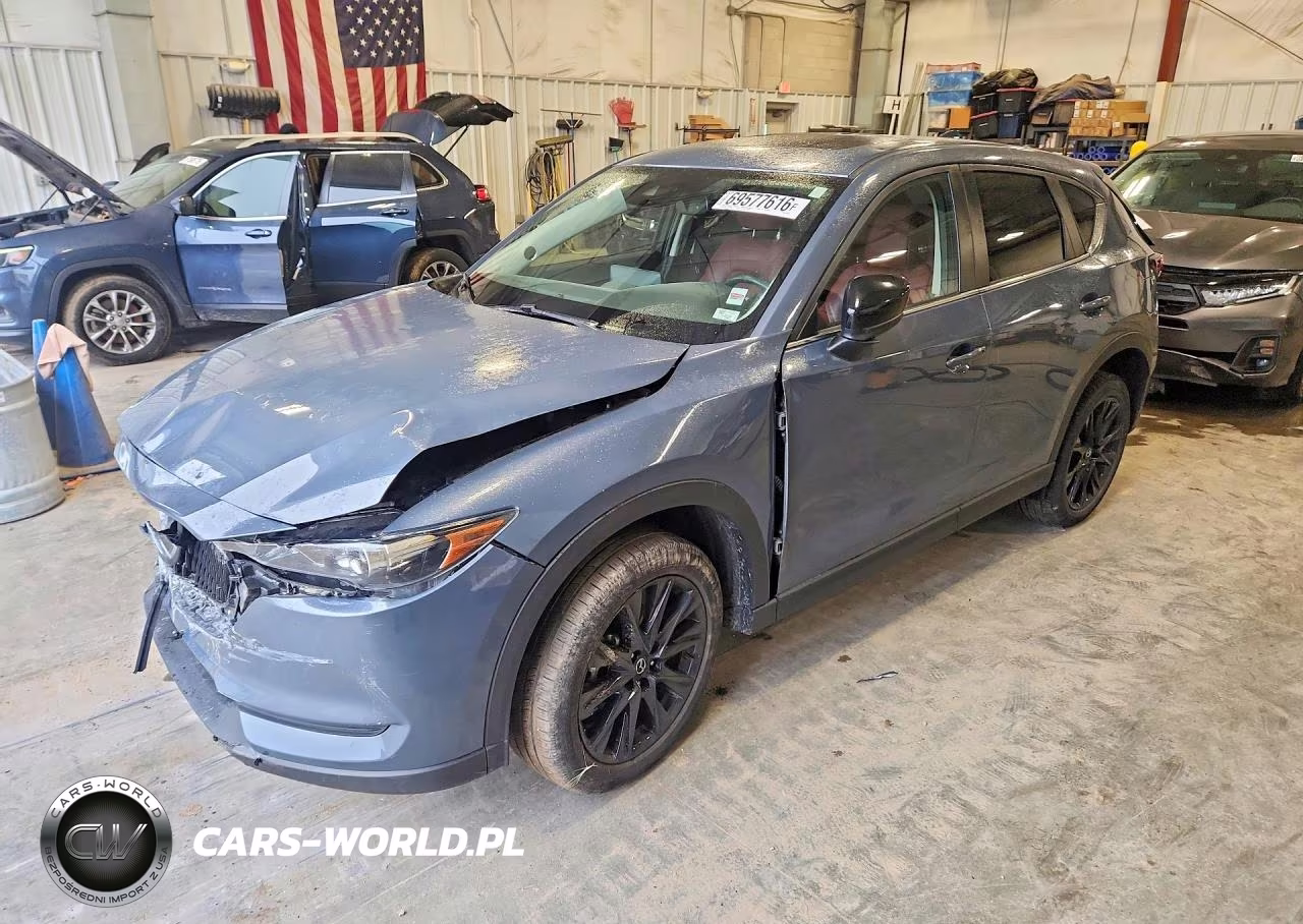 2021 Mazda Cx-5 Touring VIN:JM3KFACM6M0345476 - 1