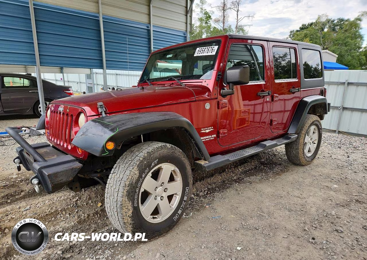 2012 Jeep Wrangler Unlimited Sahara VIN:1C4BJWEG7CL123554 - 1