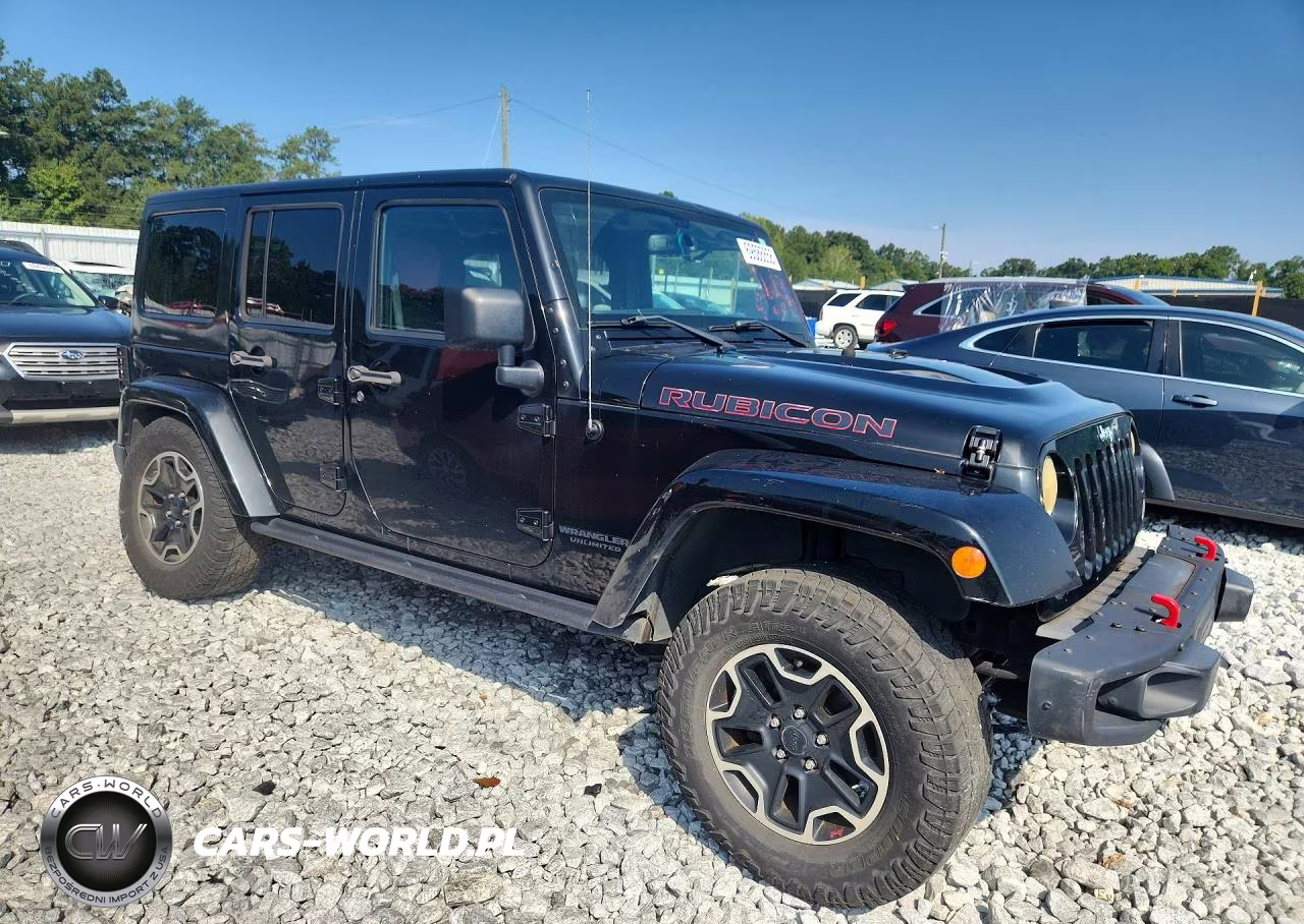 2014 Jeep Wrangler Unlimited Rubicon VIN:1C4BJWFGXEL207112 - 4