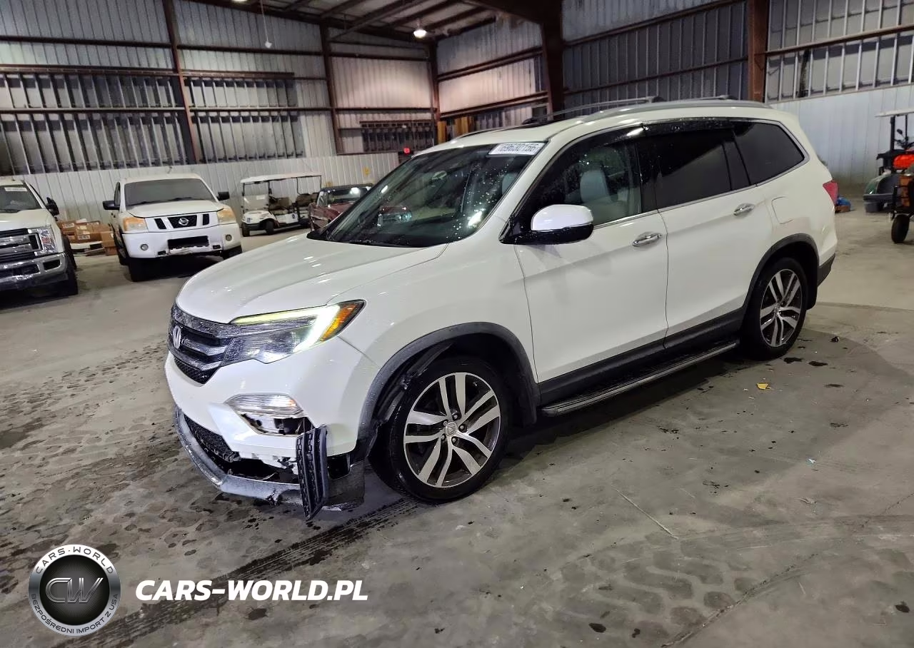 2017 Honda Pilot Touring VIN:5FNYF5H95HB026429 - 1