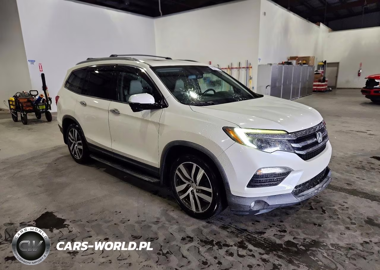 2017 Honda Pilot Touring VIN:5FNYF5H95HB026429 - 4