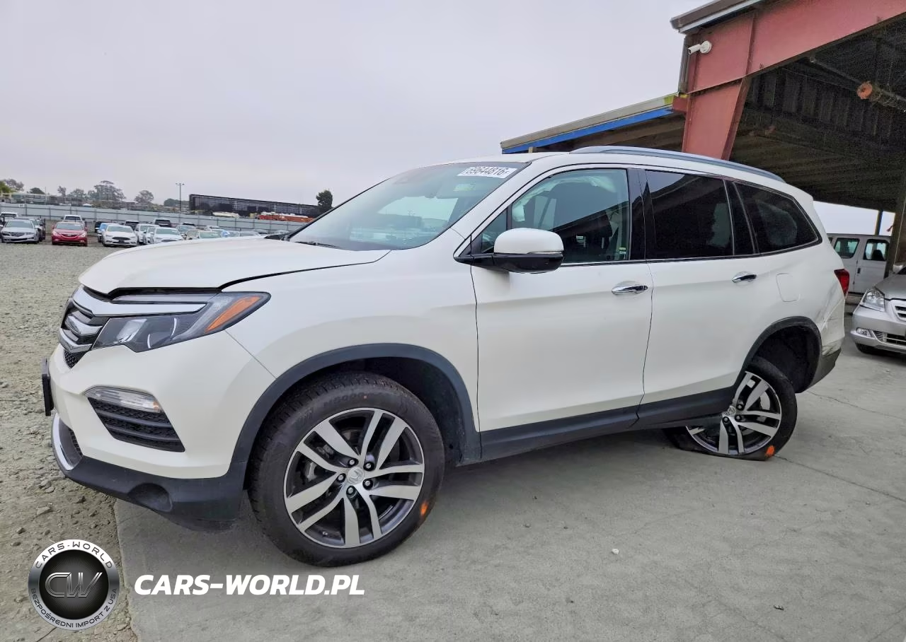 2017 Honda Pilot Touring VIN:5FNYF5H96HB026567 - 1