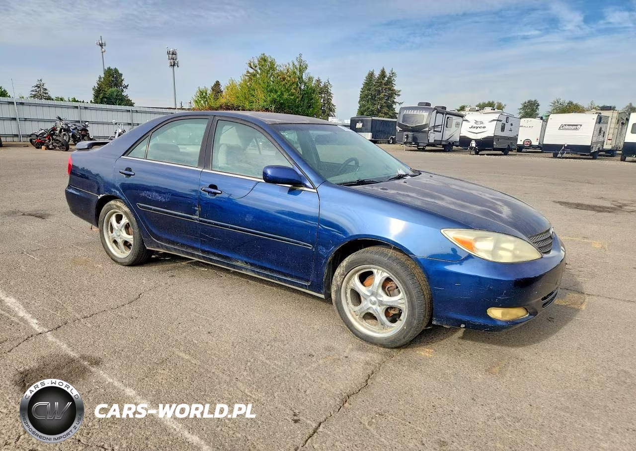 2002 Toyota Camry Le VIN:JTDBE32K620029094 - 4