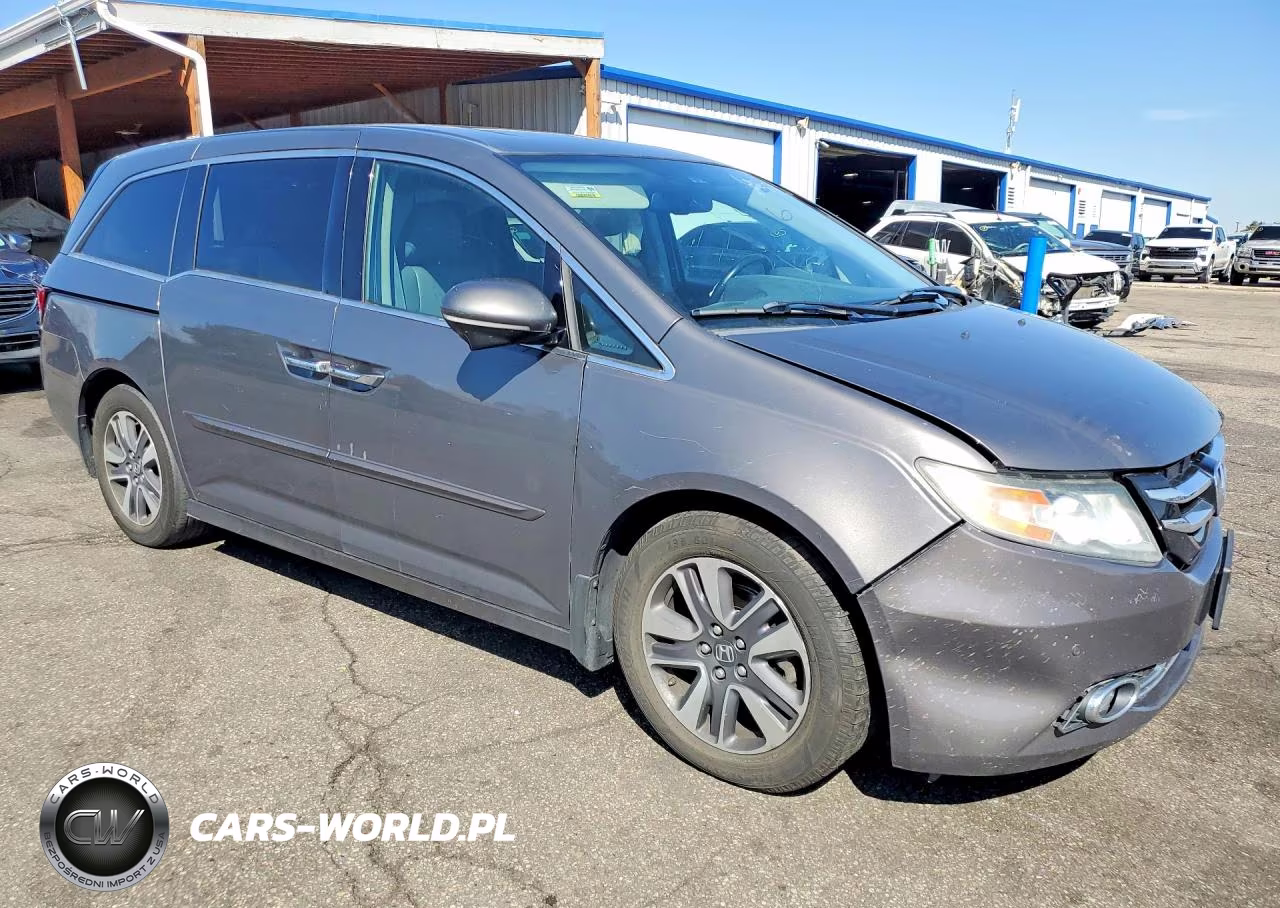 2015 Honda Odyssey Touring VIN:5FNRL5H92FB091541 - 4