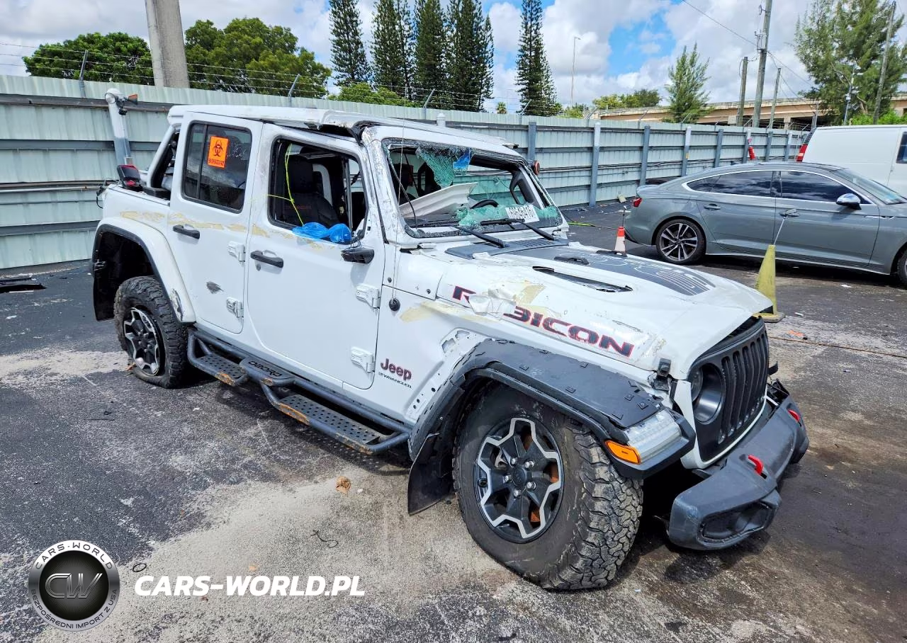 2023 Jeep Wrangler Rubicon VIN:1C4JJXFM0PW589854 - 4