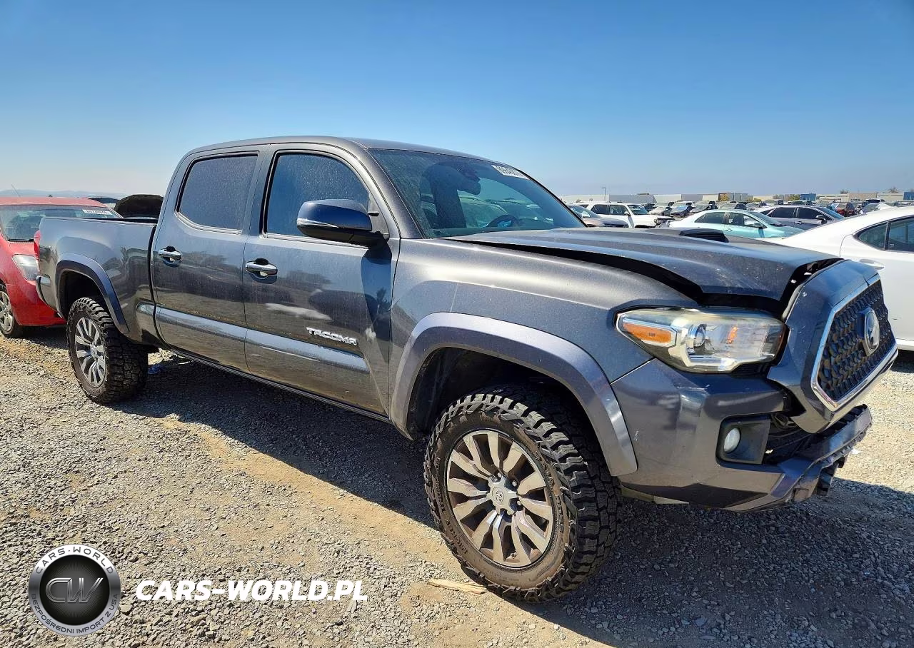 2018 Toyota Tacoma Trd Sport VIN:3TMDZ5BN4JM038875 - 4