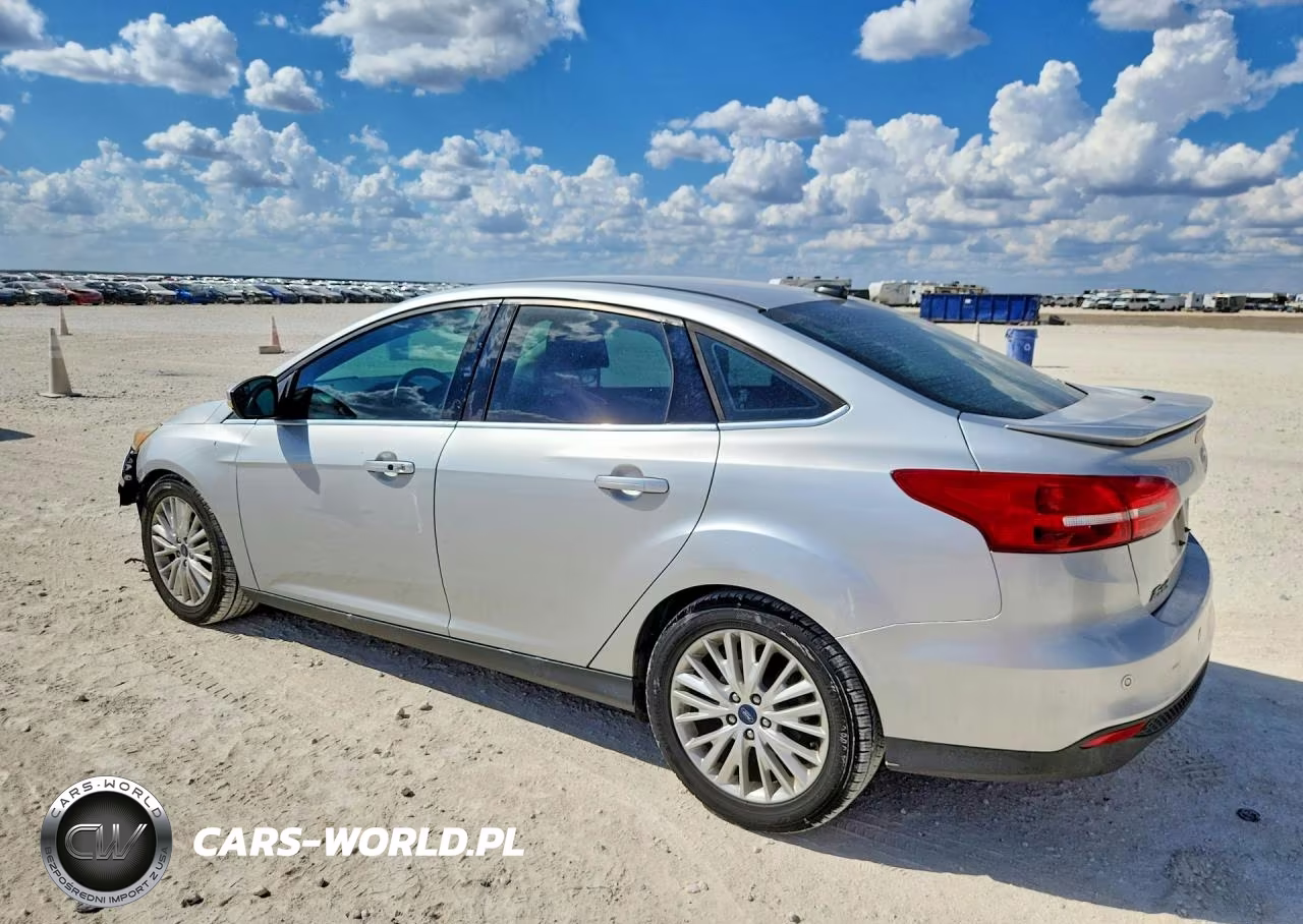 2016 Ford Focus Titanium VIN:1FADP3J2XGL360518 - 2