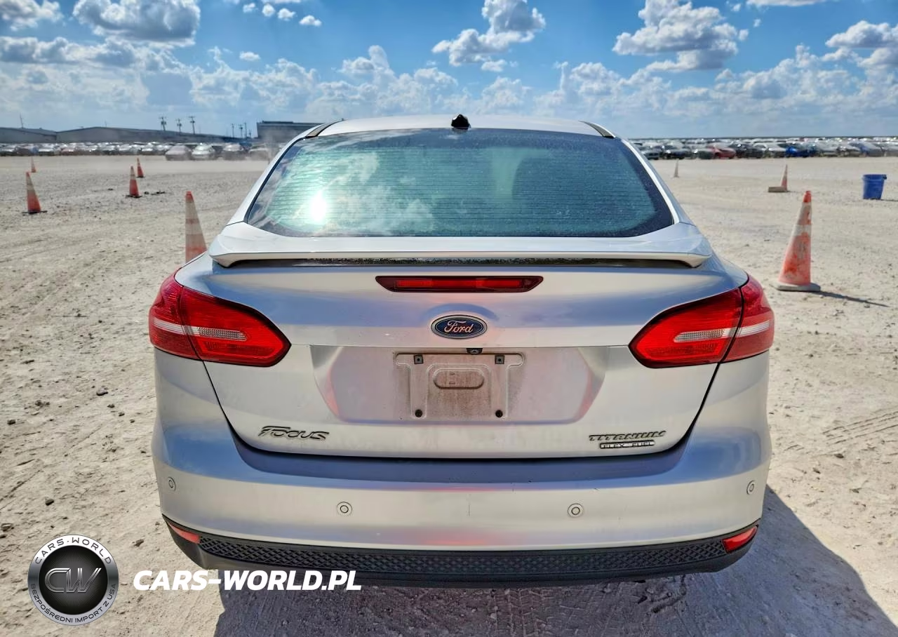 2016 Ford Focus Titanium VIN:1FADP3J2XGL360518 - 6
