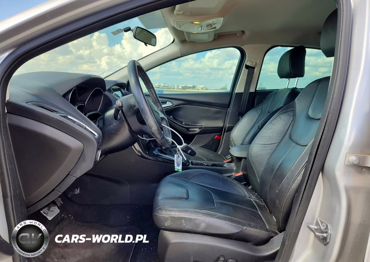 2016 Ford Focus Titanium VIN:1FADP3J2XGL360518 - 7